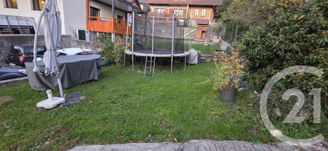 Appartement à louer - 5 pièces - 66.61 m2 - GRUFFY - 74 - RHONE-ALPES - Century 21 Cd Immo